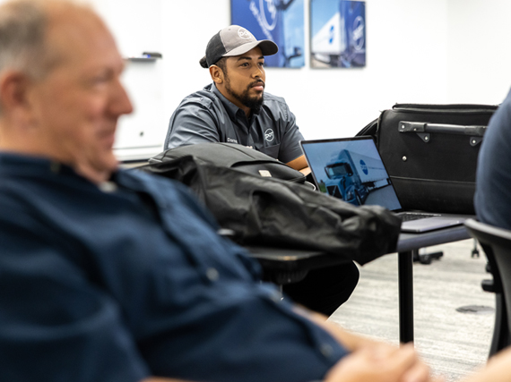 two males sitting in classroom